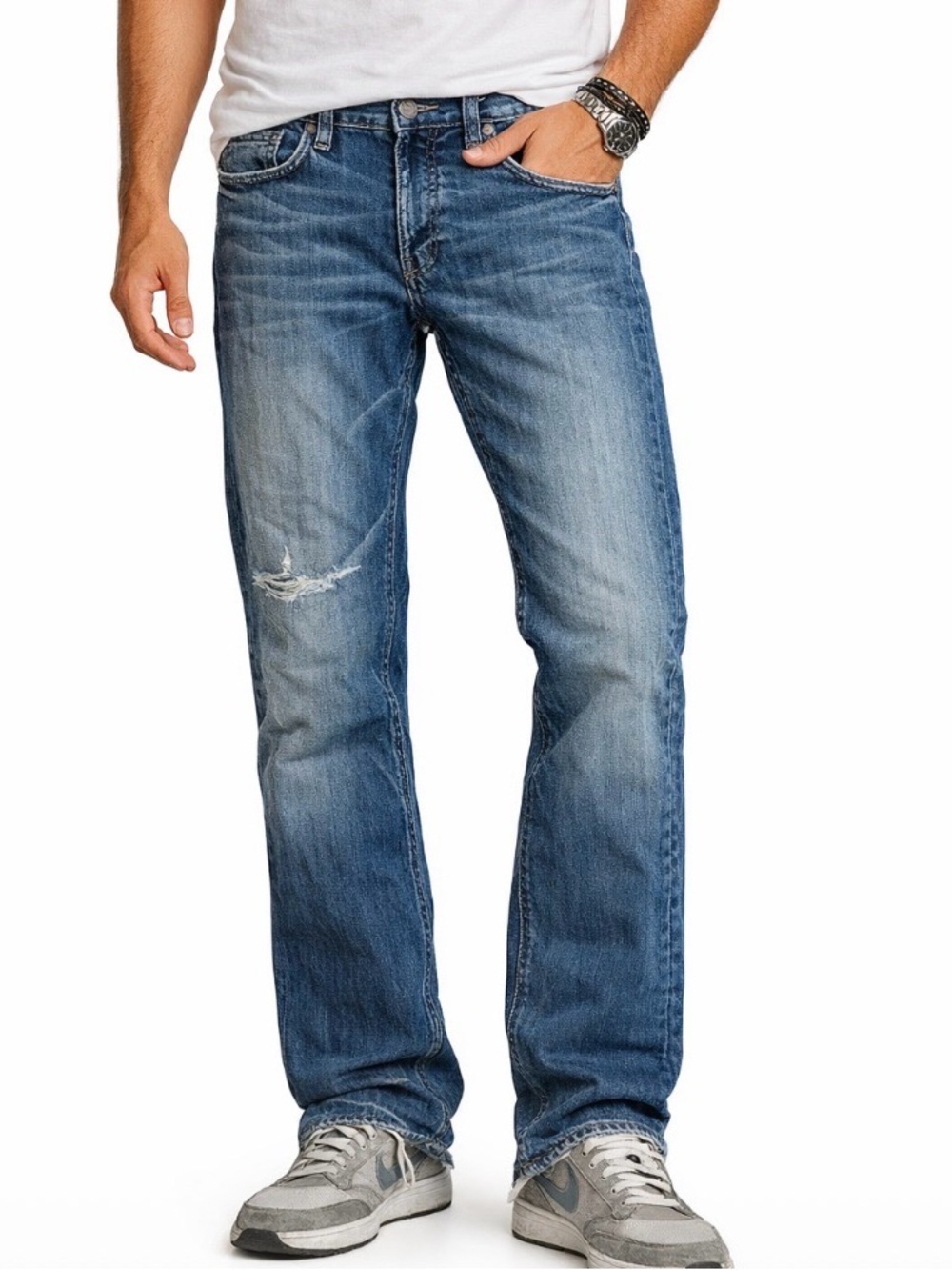 7 For All Mankind jeans in vintage medium wash. Relaxed fit through straight leg